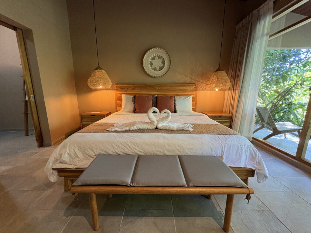 La Casita bedroom with king bed and swan-folded towels