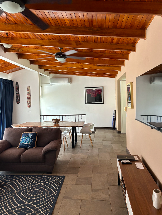 Living and dining room of the three-bedroom apartment